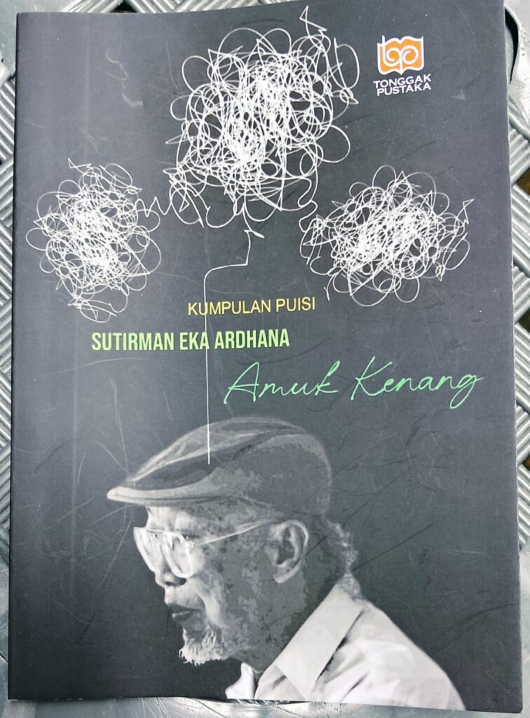 Cover of a poetry collection by sutirman eka ardhana titled amuk kenang with white scribble drawings above a grayscale profile of a man wearing a cap and glasses and a tonggak pustaka logo visible on the upper right